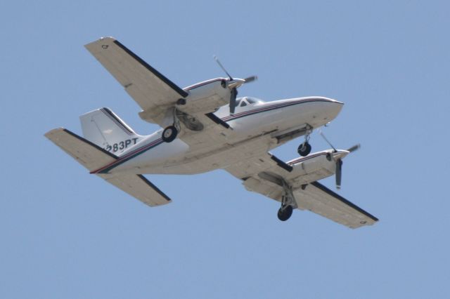 Cessna 421 (N286PT) - Cessna 421 (N283PT) on approach to Runway 32 at Sarasota-Bradenton International Airport following a flight from Hollywood International Airport