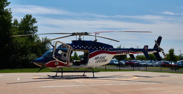 Bell 407 (N491AE) - Facing South, just unloaded critical patient.