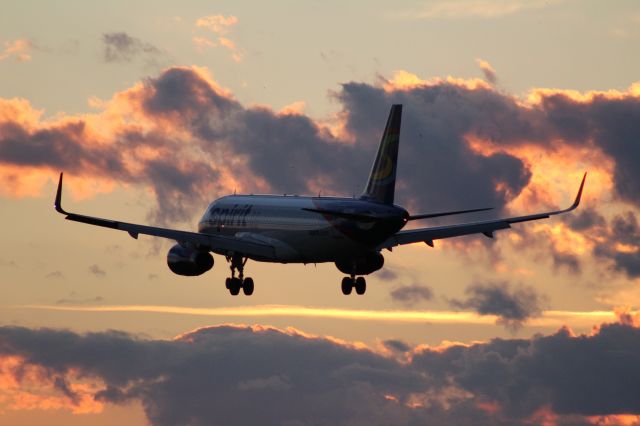 Airbus A320 (N630NK) - Spirit Airlines A320 on final during sunset.