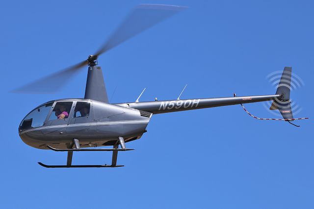 Robinson R-44 (N590H) - Flying over.