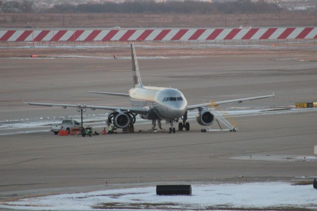 Airbus A319 (N519NK) - 121013 Spirit of Cancun receiving engine maintenance by Terminal E remote