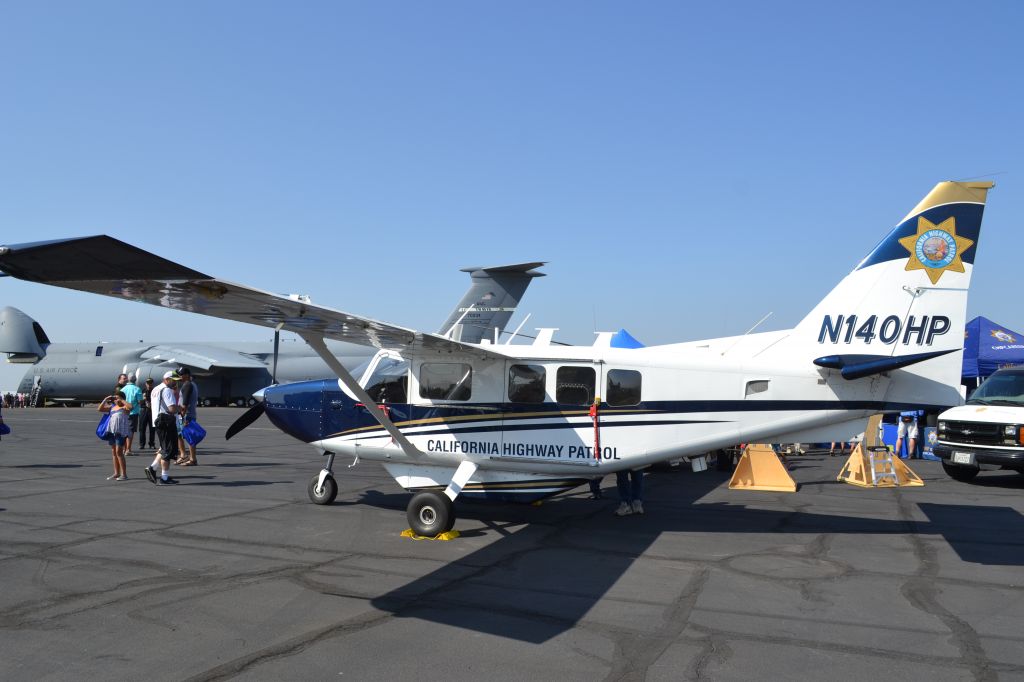 GIPPSLAND GA-8 Airvan (N140HP) - At the CCA, finally caught my own photo of 140! Cool little plane! Note the C-5M in the background.