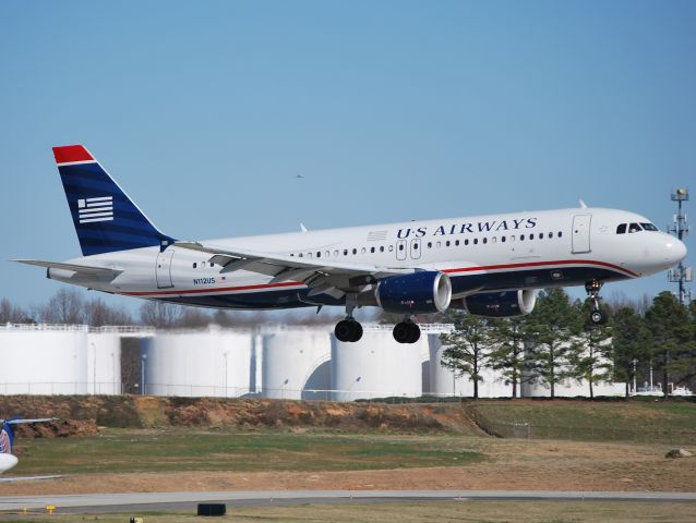 Airbus A320 (N112US) - Arriving 18C - 2/28/12