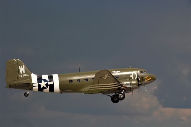 Douglas DC-3 (N88874) - Thats All Brother taking off in to a D-Day Like Normany Sky at Oshkosh.  