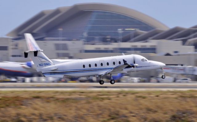 Beechcraft 1900 (N29NG) - This photo was taken earlier this year on July 30, 2014. Northrop Grumman Beechcraft 1900 landng on runway 24R at LAX. 