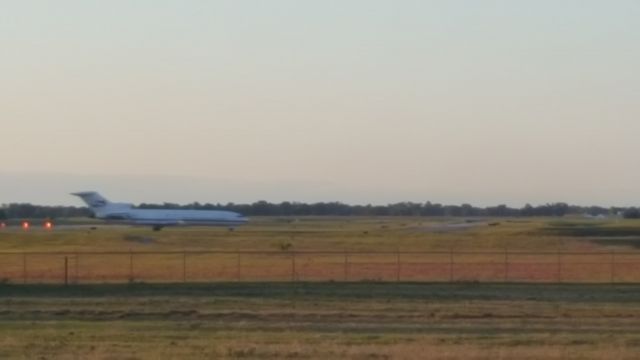 BOEING 727-200 (N725CK) - Sorry for the bad quality I took this with my phone and it came on runway 18 instead of runway 36 which is where I was standing.