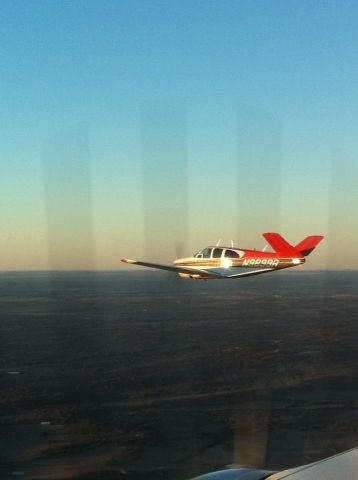 Beechcraft 35 Bonanza (N9899R) - Formation Flying