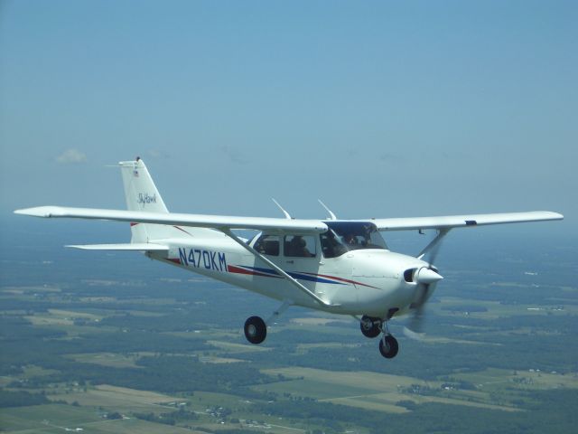 Cessna Skyhawk (N470KM) - Kyle Magon in formation over Eastern Ohio.  Photo taken from a Pitts S-2B by his father, Christopher Magon.