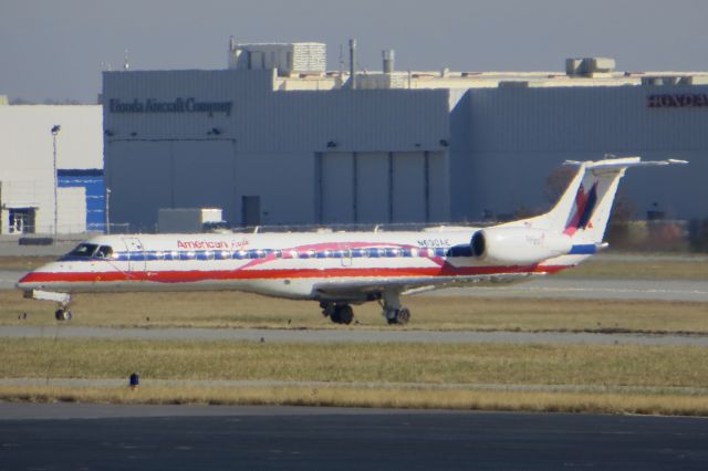 Embraer ERJ-145 (N690AE) - American Eagle ERJ-145 "Proud Suporter of Susan G. Komen for the Cure" 12/1/13