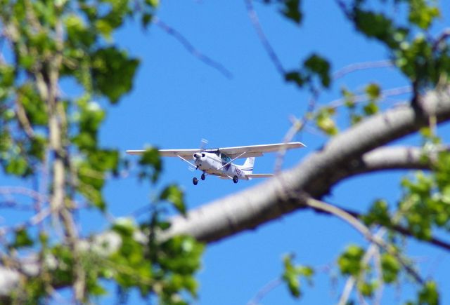 Cessna Skyhawk (N4891J) - Air One Flight Academy Cessna 172 doing pattern work at KPWA 03-APR-2016