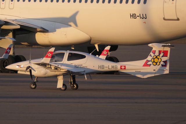 Diamond Twin Star (HB-LMB) - At sunset on 5th Feb 2024: New aircraft for «European Flight Academy» in Edelweiss Air livery.