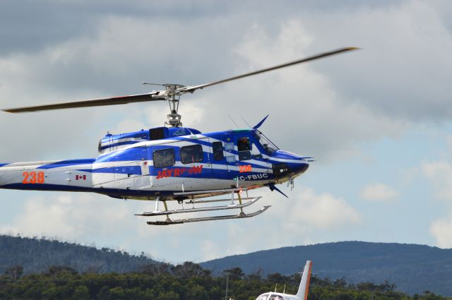 Bell UH-1V Iroquois (C-FBUC) - Bell205 C-FBUC landing at Flinders Island, March 2016