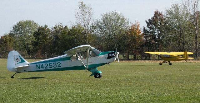 Piper NE Cub (N42532) - Taxiing for departure is this 1945 Piper J3C-65 Cub in the Autumn of 2022.