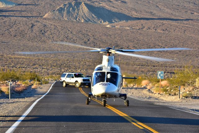 SABCA A-109 (N238AM) - An Air Methods Augusta A109E landing on California State Highway 190 in Death Valley National Park in response to a life threatening car accident