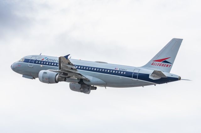 Airbus A319 (N745VJ) - An American Airlines A319 in Allegheny retro livery taking off from PHX on 2/14/23. Taken with a Canon R7 and Canon EF 100-400 II L lens.