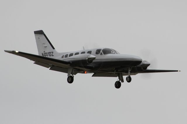 Cessna Conquest 2 (N441DZ) - Lyddons Conquest bringing home oil field workers from North Dakota on a dreary May afternoon in Colorado.