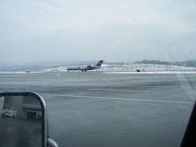 Canadair Regional Jet CRJ-200 — - AWI 3922 1/1/10 arrival from PHL taxing to gate