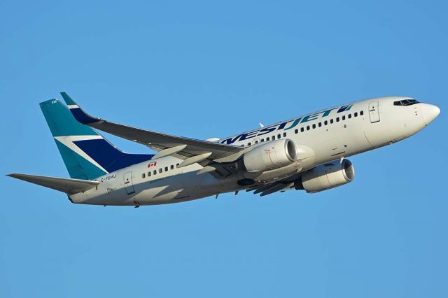 Boeing 737-700 (C-FEWJ) - WestJet Boeing 737-7CT C-FEWJ at Phoenix Sky Harbor on November 11, 2017.