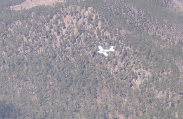 PZL-OKECIE PZL-111 Koliber Senior (N149AA) - Over the Black Hills in South Dakota