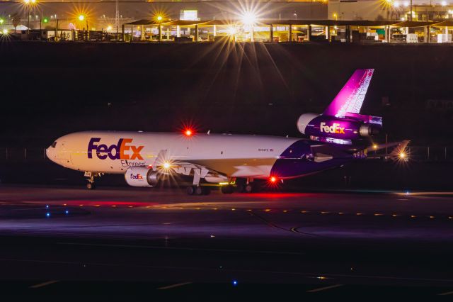 Boeing MD-11 (N594FE) - FedEx MD11 taxiing at PHX on 12/10/22. Taken with a Canon R7 and Tamron 70-200 G2 lens.