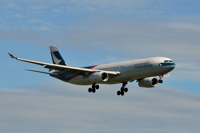 Airbus A330-300 (B-LAD) - Cathay Pacific flight CX104 from Adelaide via Melbourne to Hong Kong landing at Melbournes Tullamarine airport runway 34. 18/05/2012