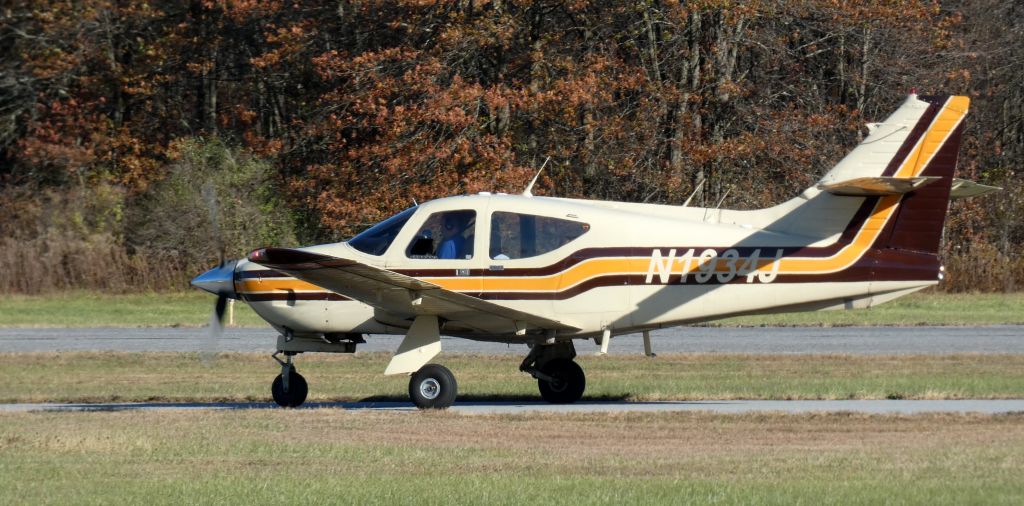 Rockwell Commander 114 (N1934J) - Taxiing for departure is this 1976 Rockwell 114 Commander in the Autumn of 2024.