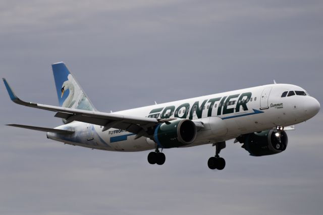 Airbus A320neo (N324FR) - Frontier A320neo in the Summer the Swan livery on approach into ORD runway 10C.