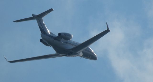 Embraer Phenom 300 (N304QS) - Shortly after departure is this 2013 Embraer Phenom 300 from the Summer of 2024.