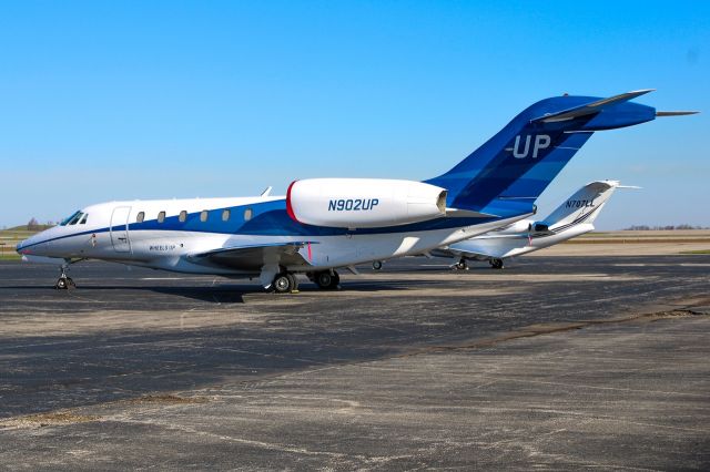 Cessna Citation X (N902UP) - Wheels up C750 sitting at Delta Private Jets.