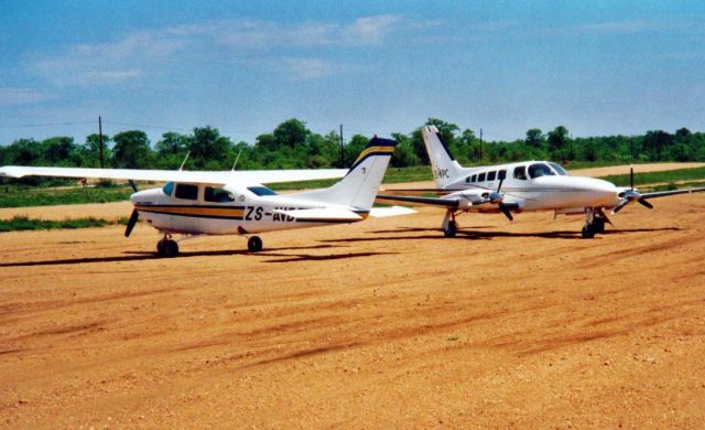 Cessna Centurion (ZS-MPC) - Together with C210 ZS-AVB at Ingwelala, South Africa