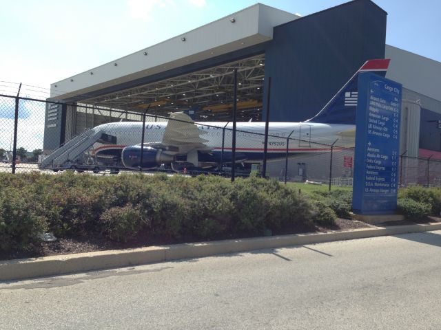 Airbus A319 (N752US) - US Airways Airbus 319 at the US Airways maintenance hanger at Philadelphia International Airport (KPHL) on August 4, 2013.