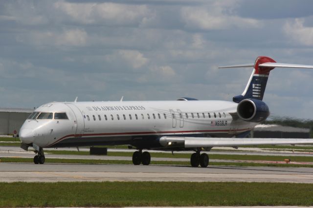 Canadair Regional Jet CRJ-900 (N938LR) - US Air Flight 2805 operated by Mesa (N938LR) taxis at Sarasota-Bradenton International Airport