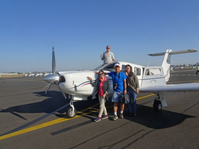 Piper Saratoga (VH-MNV) - Christian taking Taiwanese friends for flight and the loved it .Well done Christian 