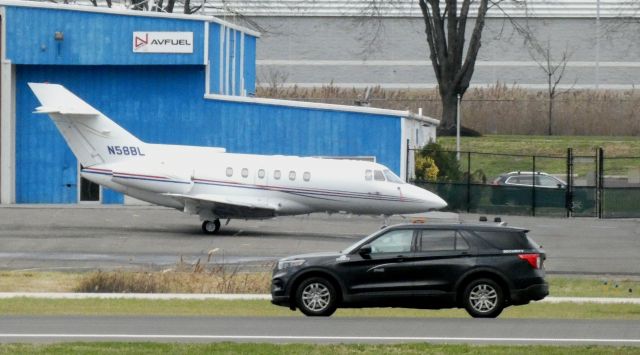 Hawker 800 (N58BL) - Catching some tarmac time is this 1993 Raytheon Bae Hawker 125-800A in the Autumn of 2020.