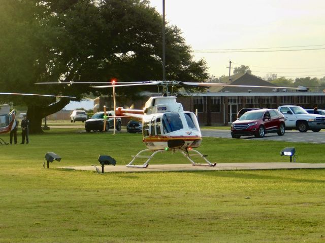 Bell 407 (N611PA) - Pafford Air One Echo getting ready for takeoff at Bolivar Medical Center with Air Evac 87 in the back waiting for them to move