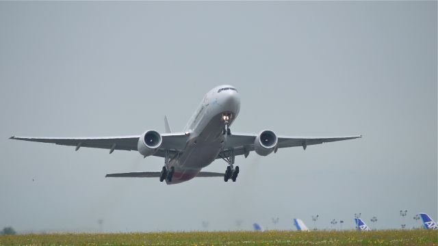 Boeing 777-200 (HL8254) - BOE586 climbs from runway 16R for a flight test on 7/14/12. The plane is a B777-28E(ER) (LN:1027).