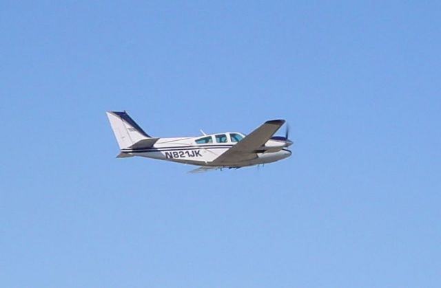 Beechcraft 55 Baron (N821JK) - Departing 09 on 3/2/09...