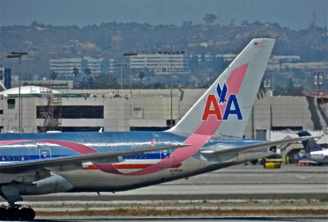 Boeing 777-200 (N759AN) - Susan G Komen for the Cure colors