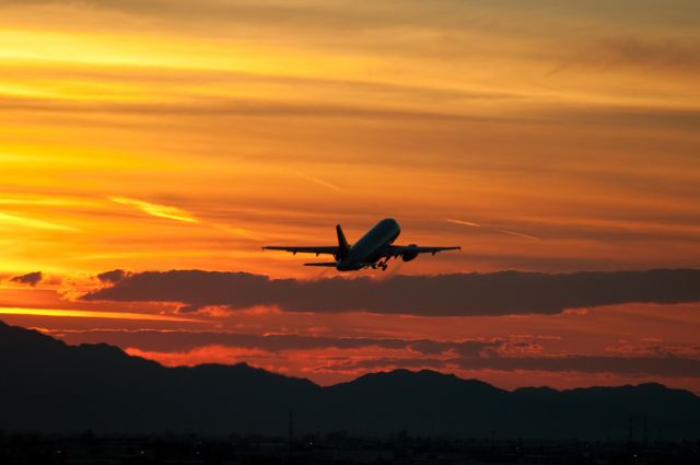 Airbus A319 (N838AW) - Taking off into the sunset, the America West Livery for US Airways.