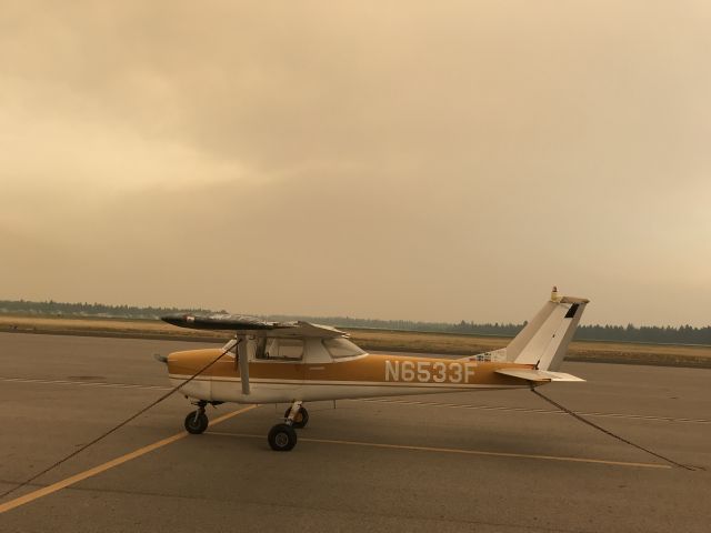 Cessna Commuter (N6533F) - Shot during the PNW’s infamous smoky summers. This 150 has been here for around a decade, and is still here as of summer 2023. Sad, considering all the stickers on the stabilizer strake. It was once dearly loved. 