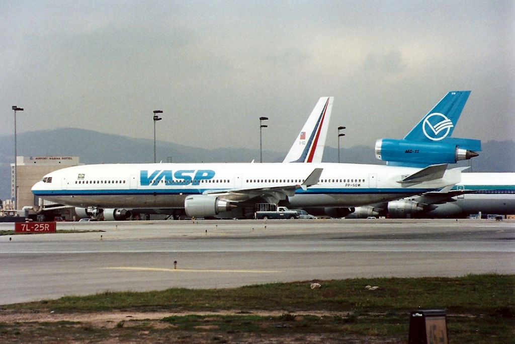 Boeing MD-11 (PP-SOW) - KLAX - Feb 1992 - Just arrived for the Inaugural flight to Sao Paulo- This brand new MD-11 taxis to the gate. I did not know when I took this that the MD-11 was brand new and arriving for the 1st Revenue flight LAX-SAO. Photo from the old Imperial Terminal Parking lot..