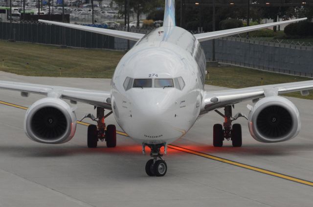 Boeing 737-900 (N274AK) - Alaska Airlines flight 718 is pulling into Gate A9 at 3:33 PM CDT.   This flight was flown on what was then Alaskas newest aircraft.    Photo taken July 28, 2017 with Nikon D3200 mounting 55-200mm VR2 lens.