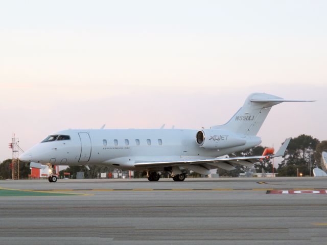 Bombardier Challenger 300 (N551XJ) - After landing runway 28L.