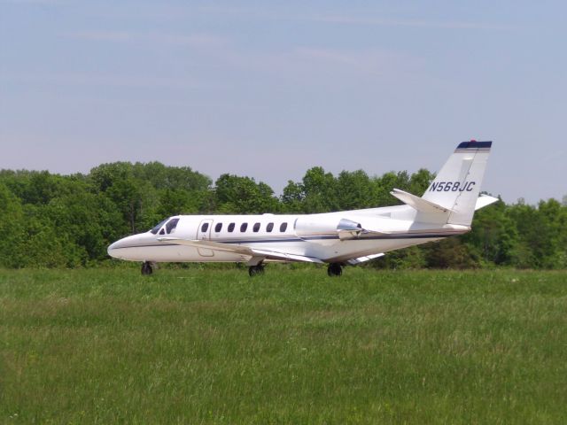 Cessna Citation V (N568JC) - In a field off taxiway. Aircraft was taxiing to RWY 24 for departure.