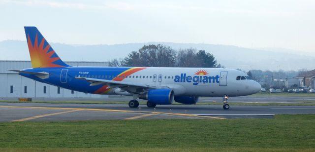 Airbus A320 (N221NV) - Turning for departure is this 2000 Allegiant Airlines Airbus 320-214 in the Autumn of 2023.