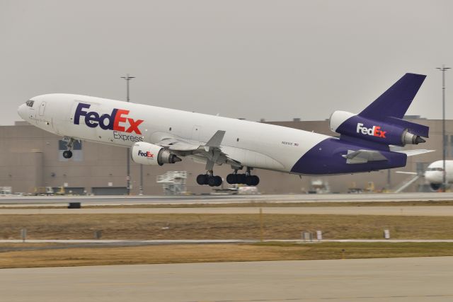 Boeing MD-11 (N601FE) - MD-11 # 1 Departing 5-R 01-18-23.