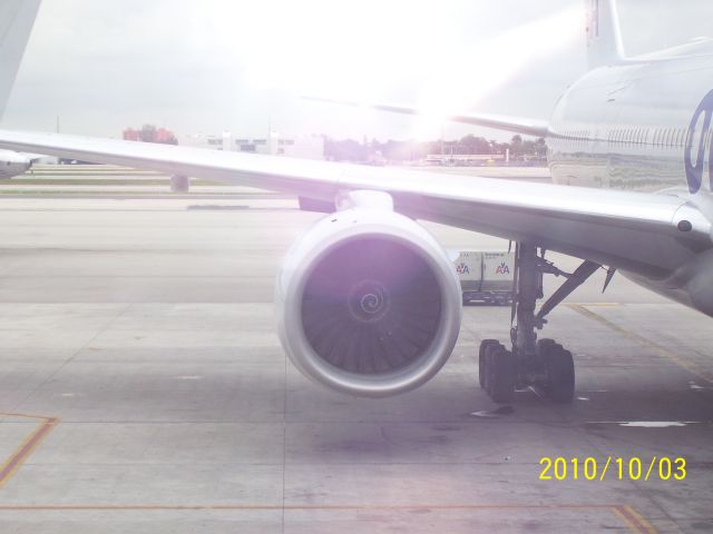 Boeing 777 — - As I wait to board my flight back to China, I contemplate the awesome power produced by this massive Pratt & Whitney powerplant.