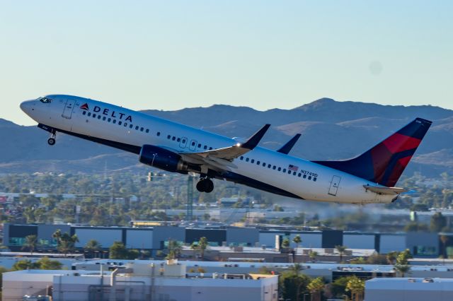 Boeing 737-800 (N3749D) - Delta Airlines 737-800 taking off from PHX on 11/11/22. Taken with a Canon R7 and Tamron 70-200 G2 lens.