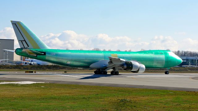 BOEING 747-8 (N614UP) - BOE539 taxis onto Rwy 16R for a ferry flight to KPDX on 2.21.19 where it will be painted. (ln 1552 / cn 64260).