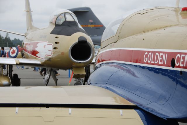 North American F-86 Sabre (C-GSBR) - Canadair CT-144 144019 and Canadair F-86E meet nose to nose.  Aircraft are both in Royal Canadian Armed Forces Golden Knight retro paint.